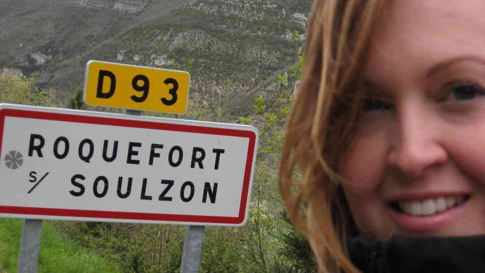 Seana with Roquefort street sign