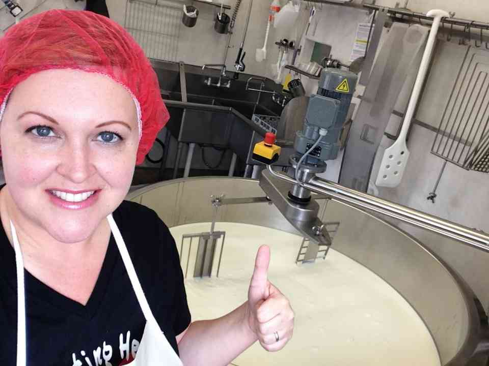 Seana at vat making cheese